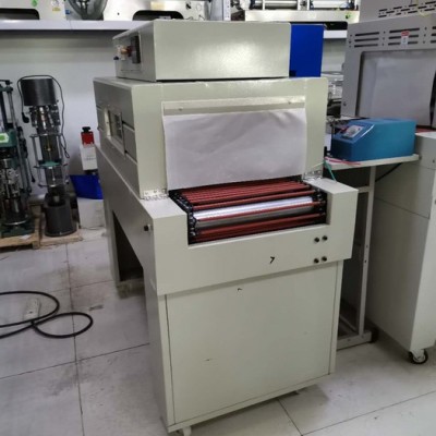 五金工具 吸塑機(jī)盒子書本全自動餐具收縮 彩盒封膜機(jī)